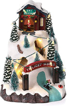 Carica l'immagine nel visualizzatore di Gallery, VILLAGGIO INVERNALE - Lumineo - MUSICALE CON LED - Christmas Village Battery Operated Carol Singers With Stream