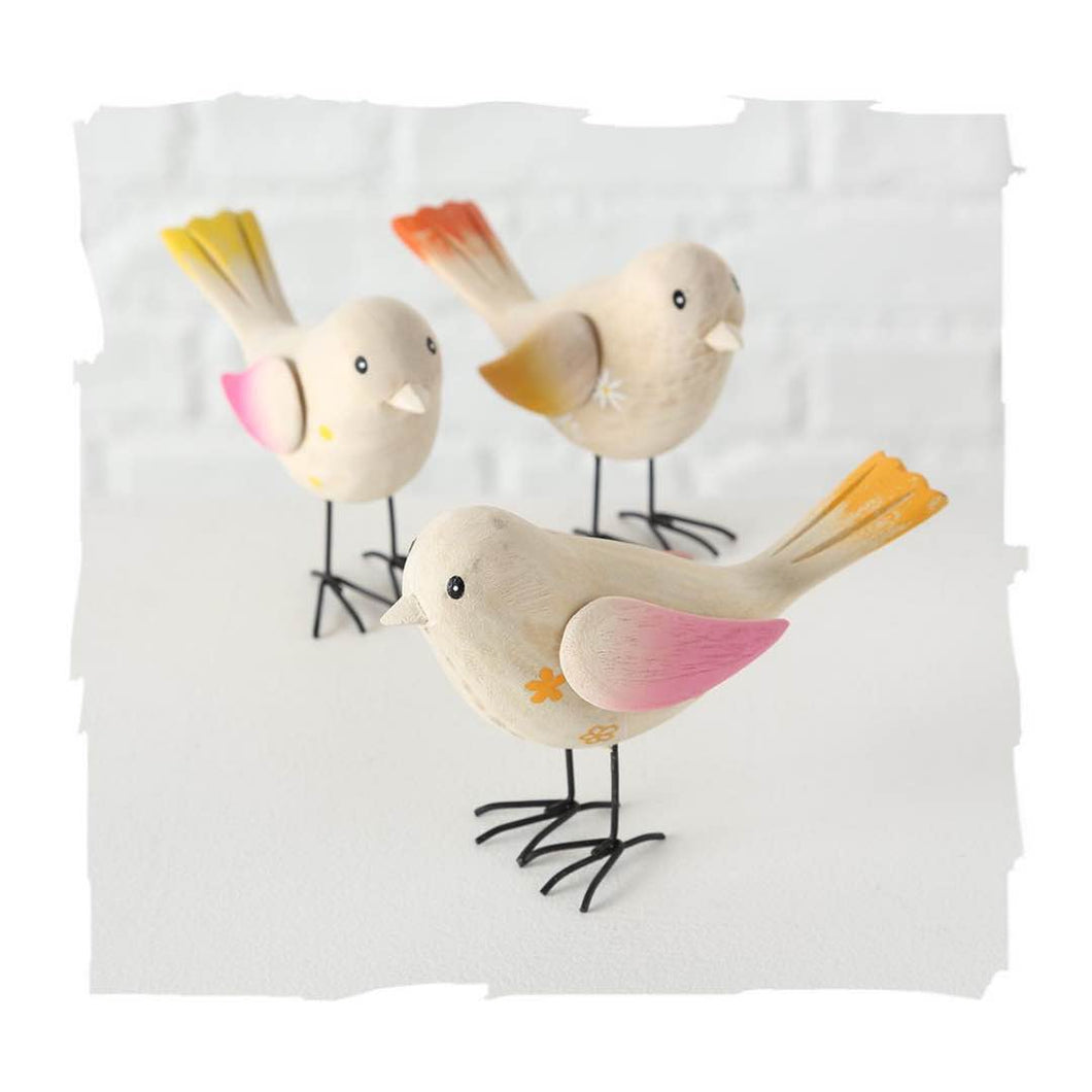 uccellini di legno dipinti